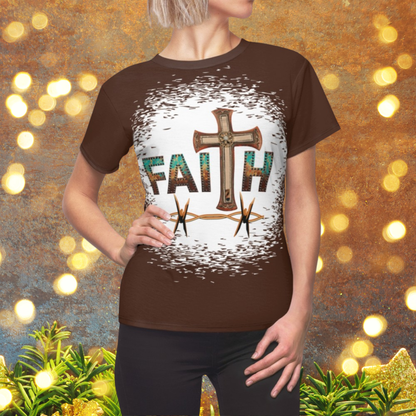 Person wearing a brown t-shirt with a cross and 'FAITH' design against a festive background.