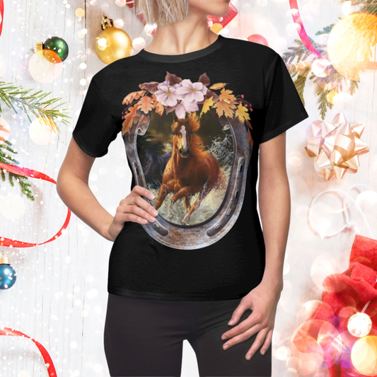Person wearing a black t-shirt with a horse and horseshoe design against a festive background.