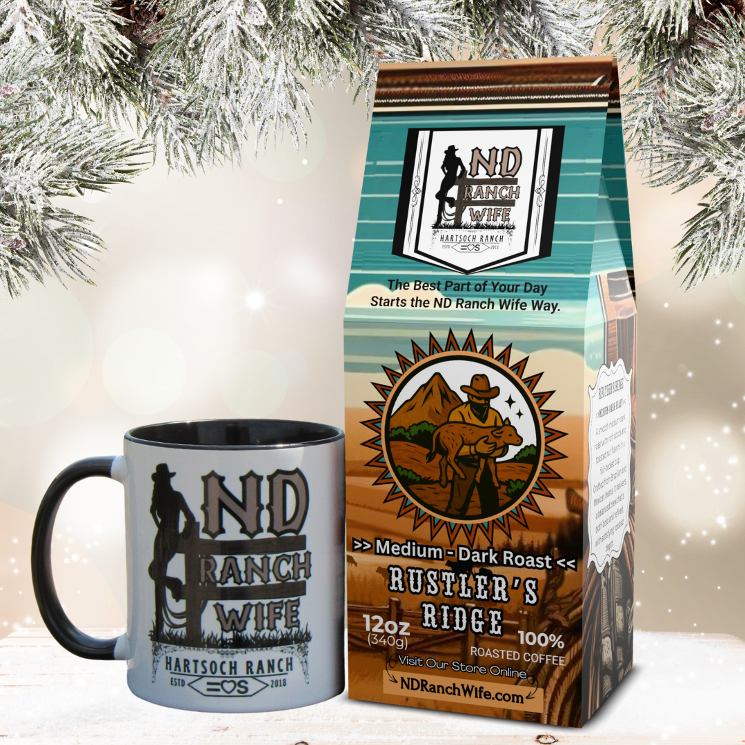 ND Ranch Wife coffee mug and Rustler's Ridge coffee bag with Christmas tree in the background