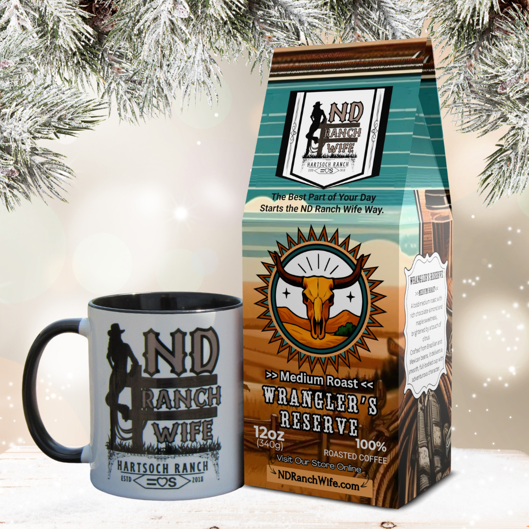 ND Ranch Wife mug and Wrangler's Reserve coffee bag with Christmas tree in the background