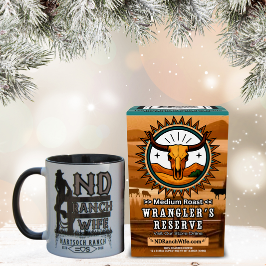 Mug and box of Wrangler's Reserve coffee with decorative background